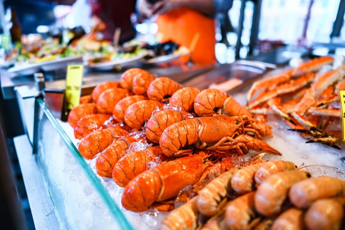 Various seafood on the shelves of the fish market