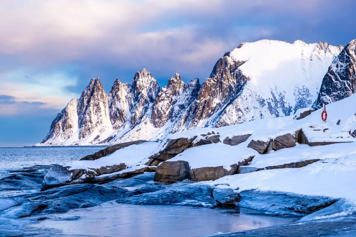 Snow-capped mountains in the Fjords in winter