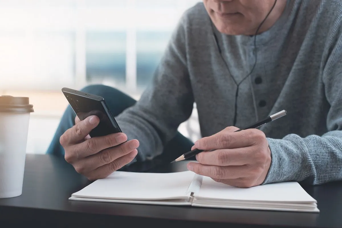 Mature man learning a new language on a language app