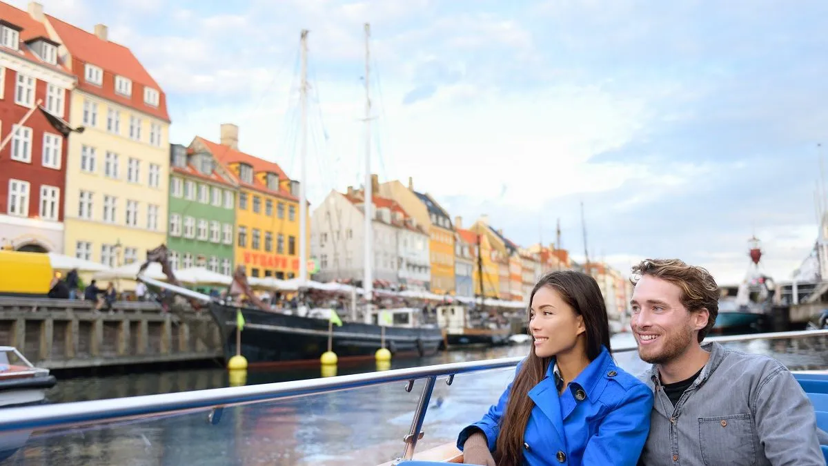 Couple on copenhagen canal boat
