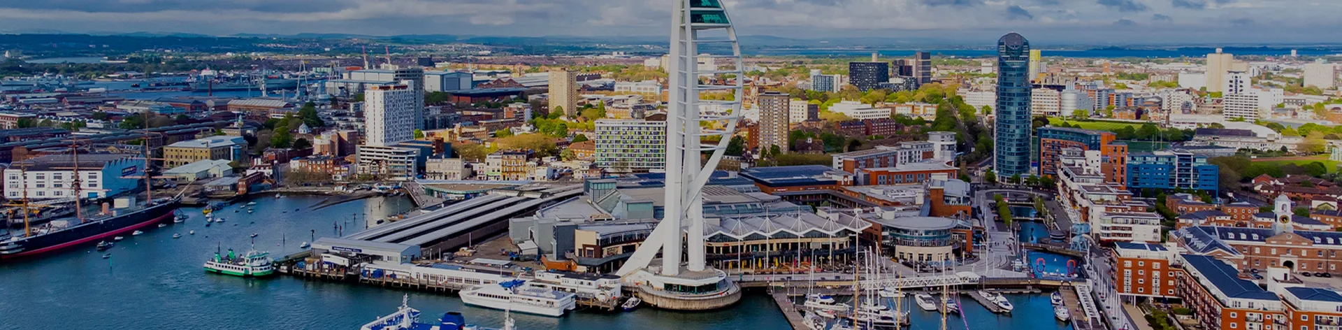 Aerial view of the sail-shaped Spinnaker Tower in Portsmouth Harbor