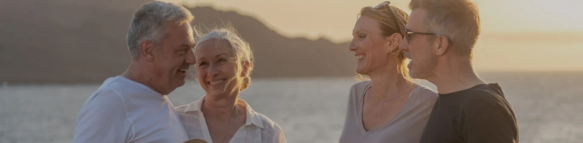 Group of friends enjoying a sunset