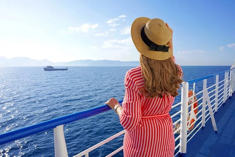 Lady getting some fresh air outside on cruise ship
