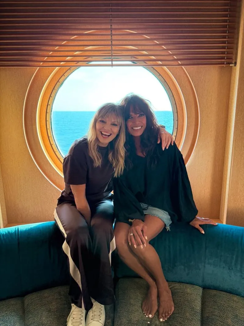 TV presenters Jenny Powell and Kate Thornton hosting an event together on board an Ambassador cruise