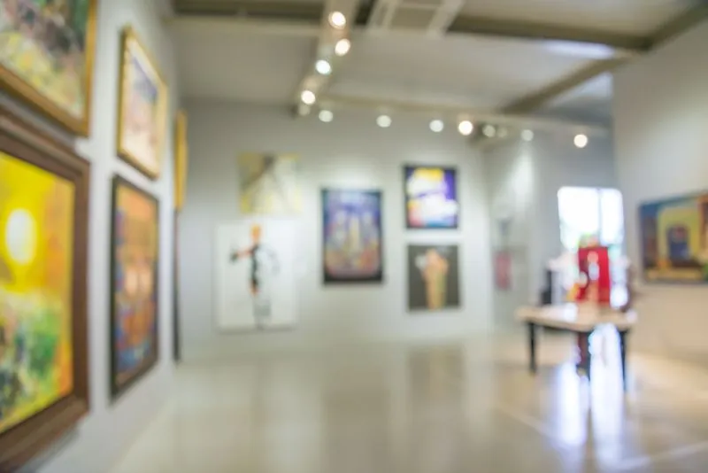 Blurred image showing inside an art gallery