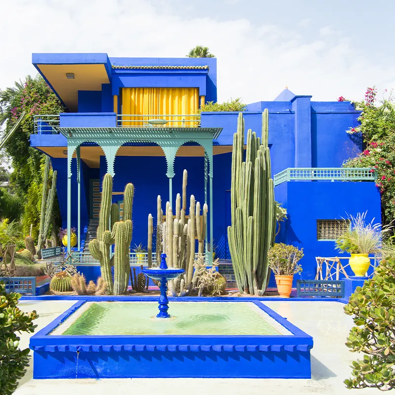 The beautiful Majorelle Garden is a botanical ,tropical garden and artist's landscape garden in Marrakech, Morocco. Le Jardin has a water fountain painted in Majorelle Blue.