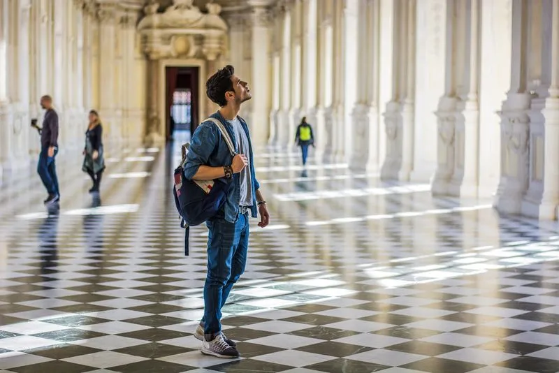 Man looking around a museum
