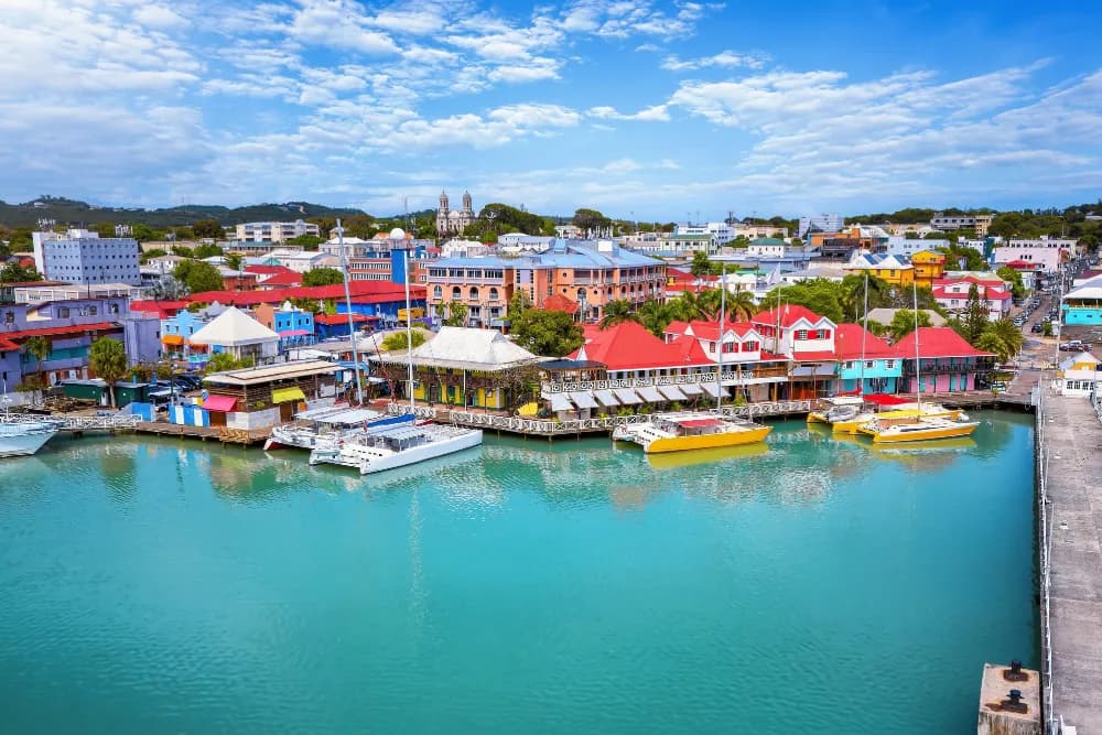 View of the blue waters and red-roof houses in the Caribbean