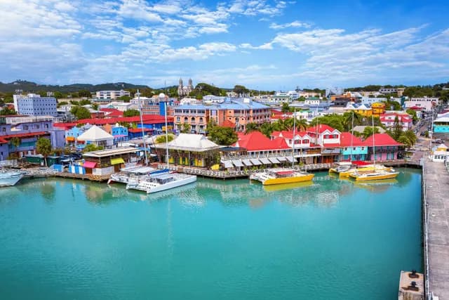 View of the blue waters and red-roof houses in the Caribbean