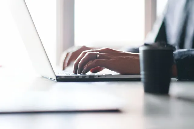 Person connecting to WIFI on there laptop