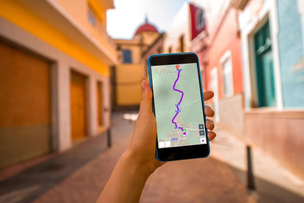 Traveller using an app whilst exploring