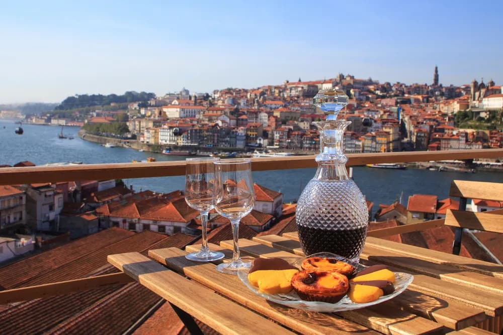 Wine glasses looking out over the view over the river in Oporto