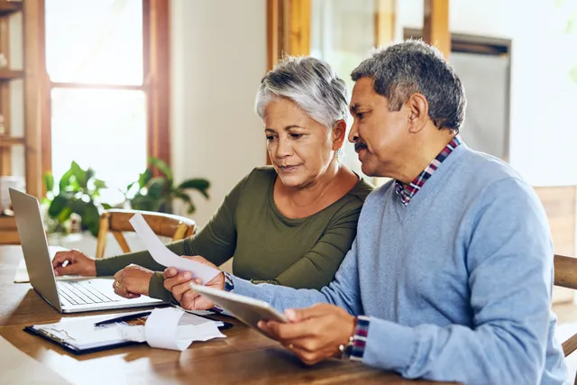 Senior couple budget planning health insurance