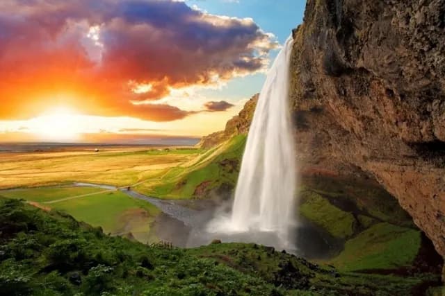 Waterfall and sunset in Iceland