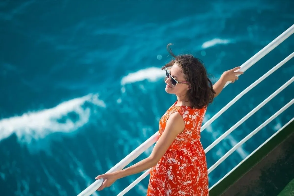 Person looking out to sea on ship