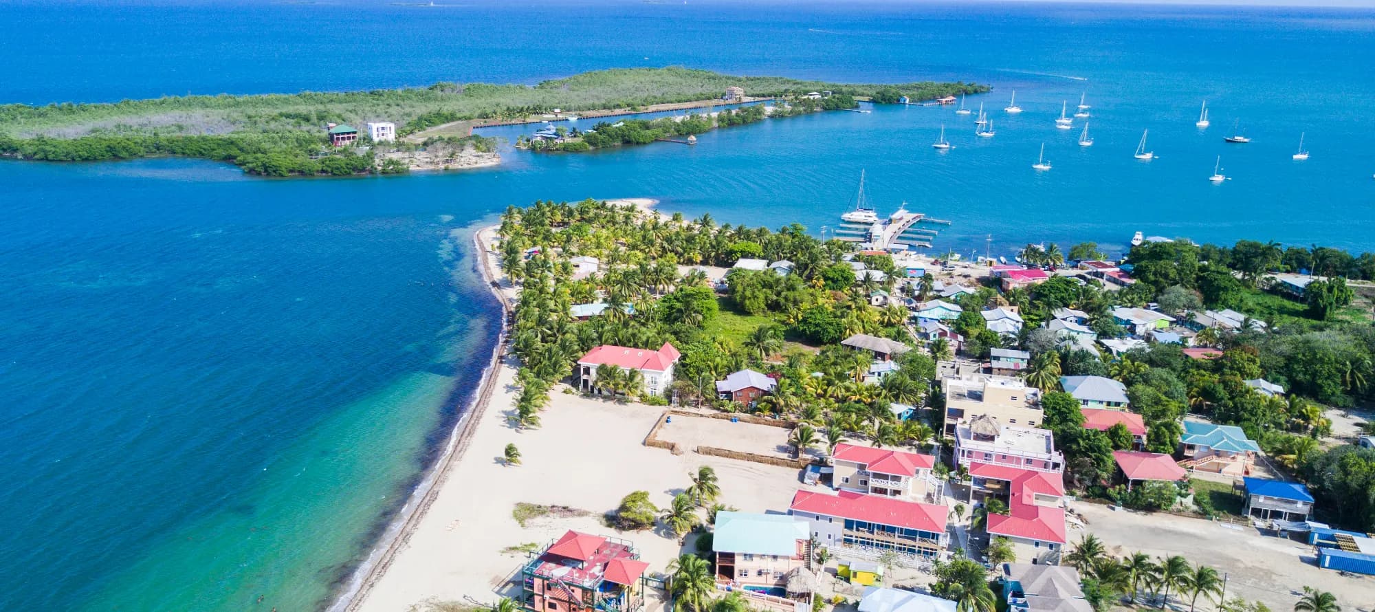 Aerial View of Placencia Village in Southern Belize. Caribbean Sea and beaches.