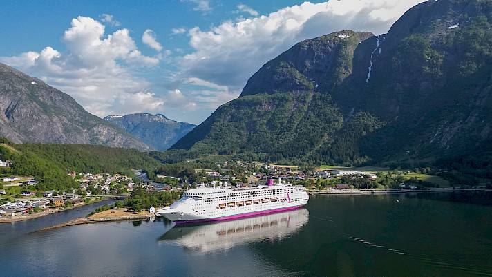 Ambience cruise ship in Eidfjord, Norway on a Norwegian Fjord cruise