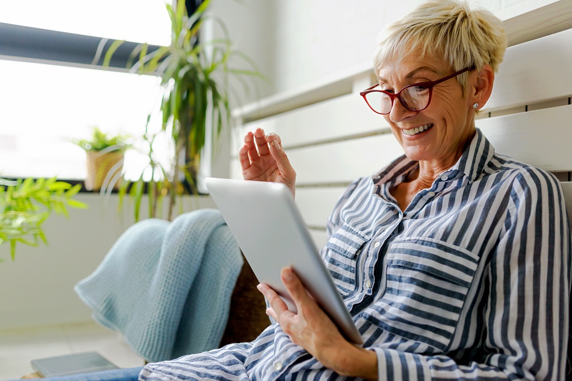 Stylish women using tablet computer