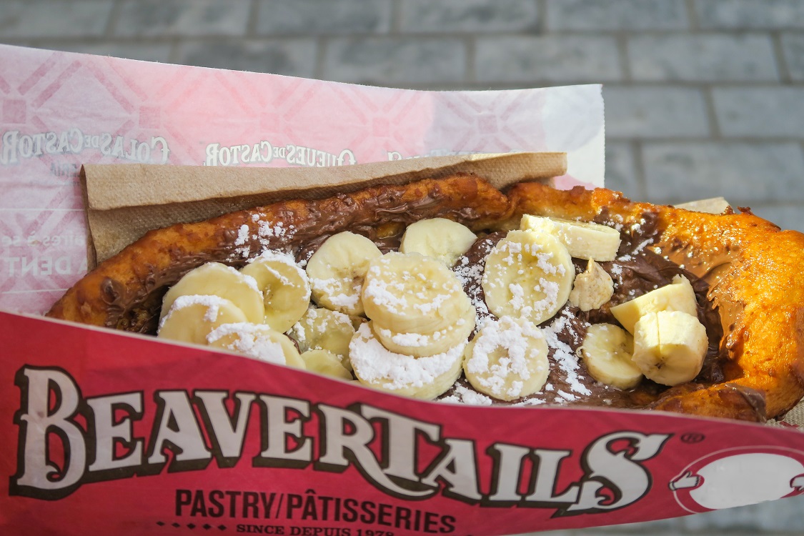 Beavertails pastry topped with chocolate and banana