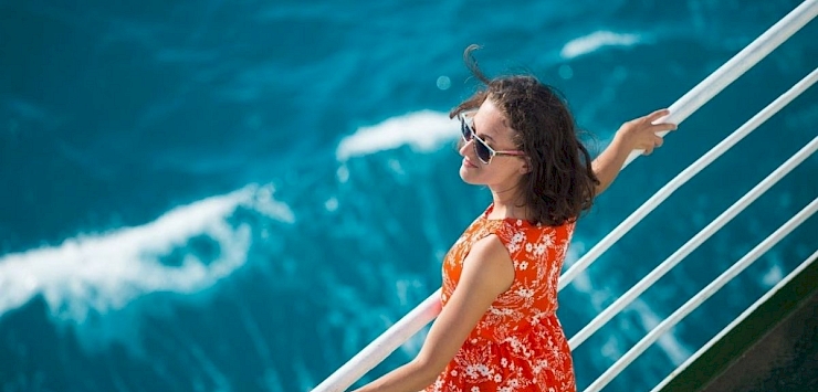 Person looking out to sea on cruise ship